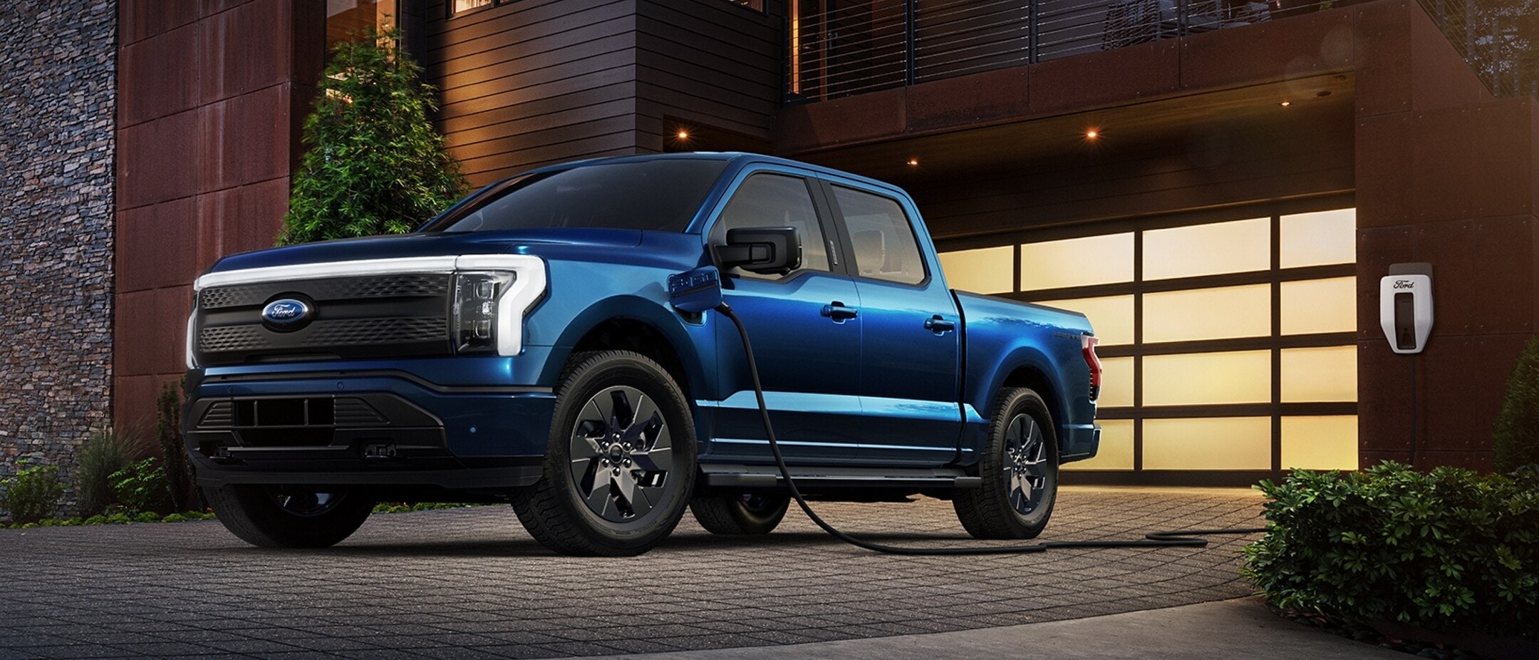 Blue Ford F-150 Lightning charging